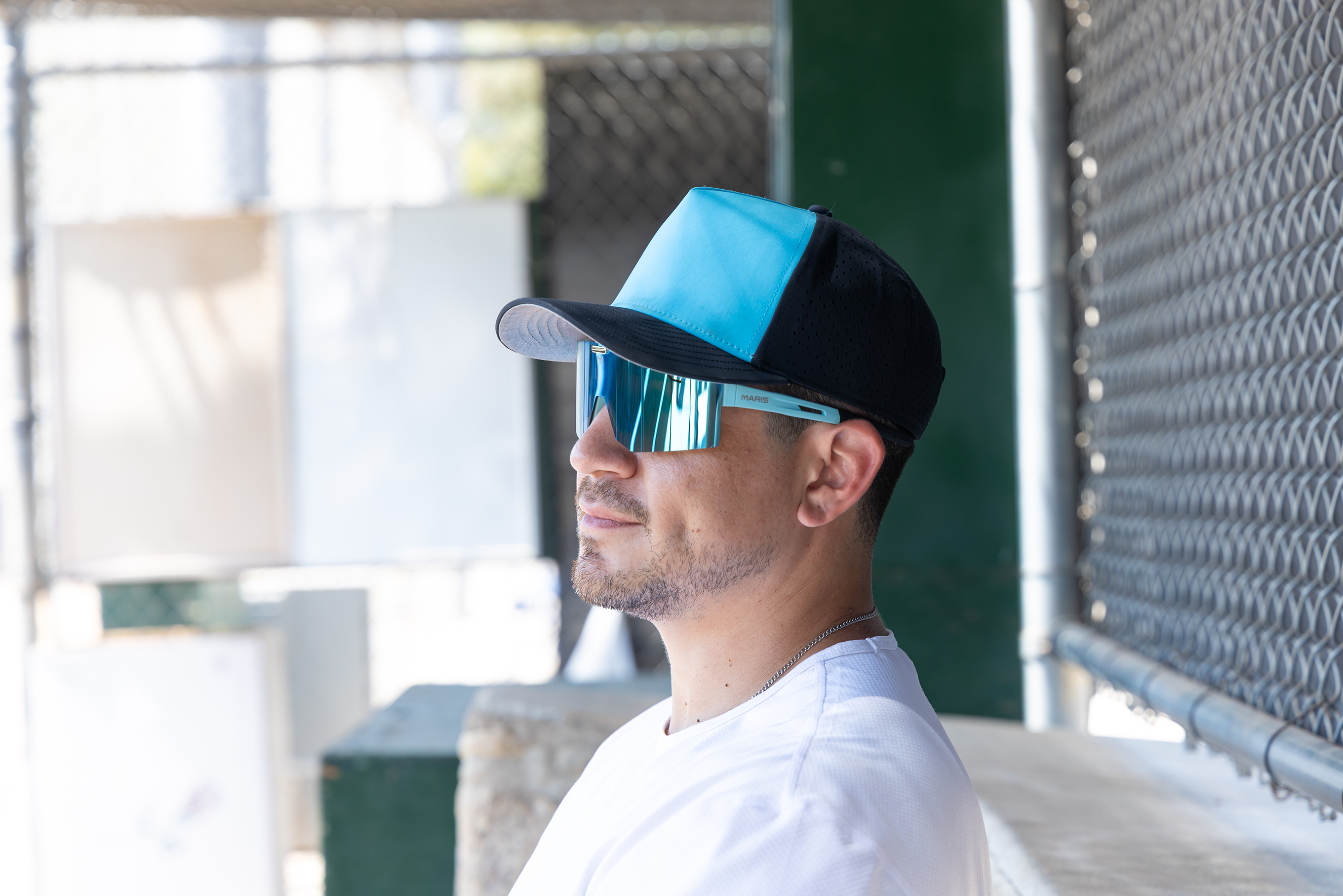 Baseball player wearing Maris Optics flip-up sunglasses on the field