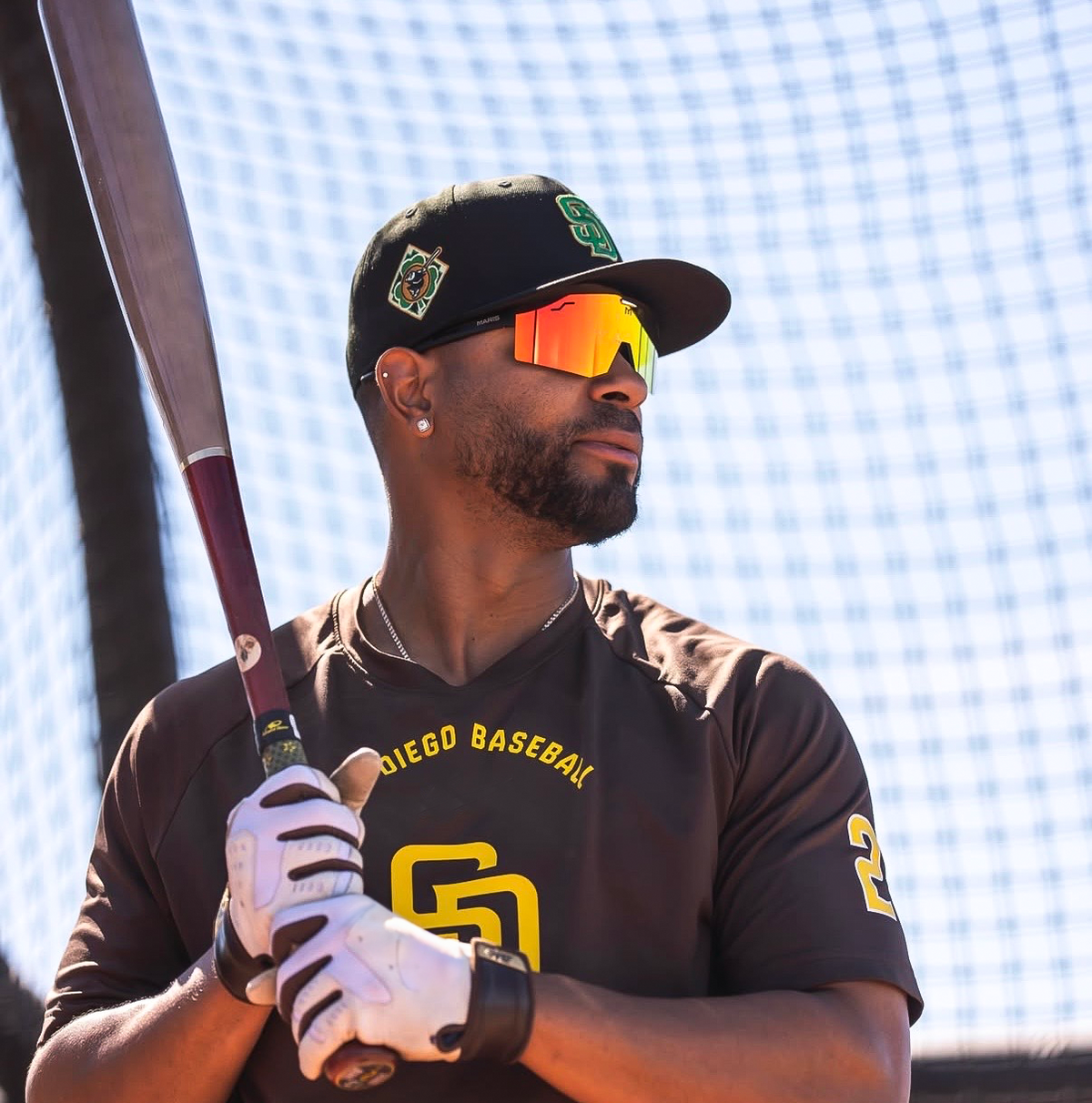 Baseball player wearing Maris Optics flip-up sunglasses on the field